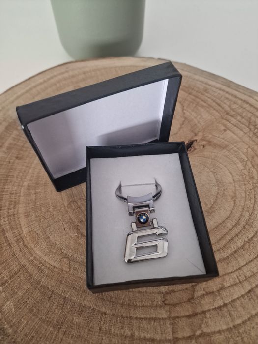 Porta chaves bmw serie 1 , 3 , 5 , 6 , 7 , X novos logo cinza cromado