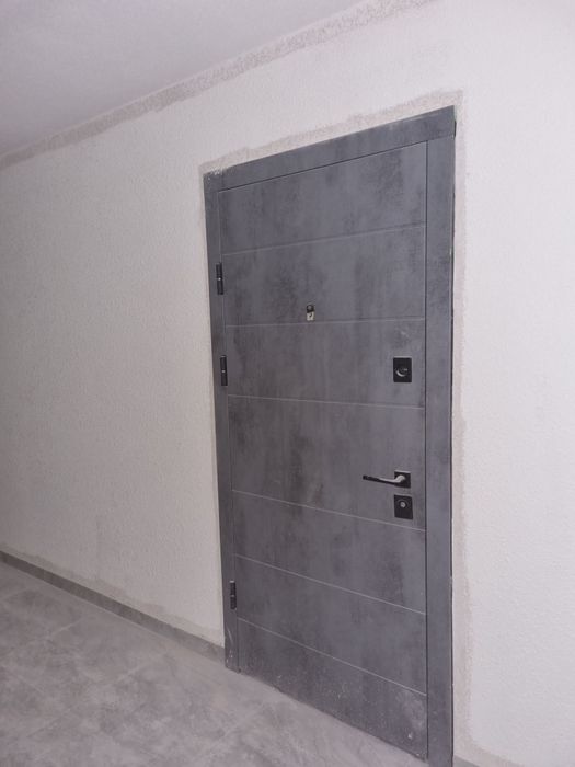 Двері вхідні 2050х950 металеві з МДФ накладкою