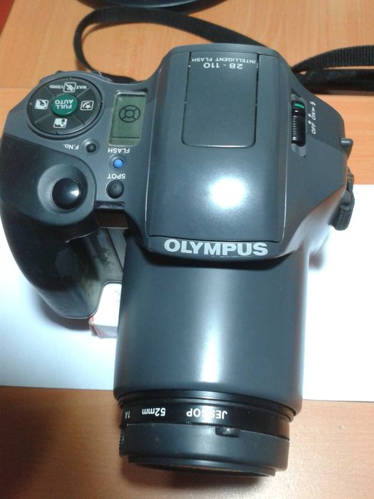 Máquina fotográfica Olympus (rolo)