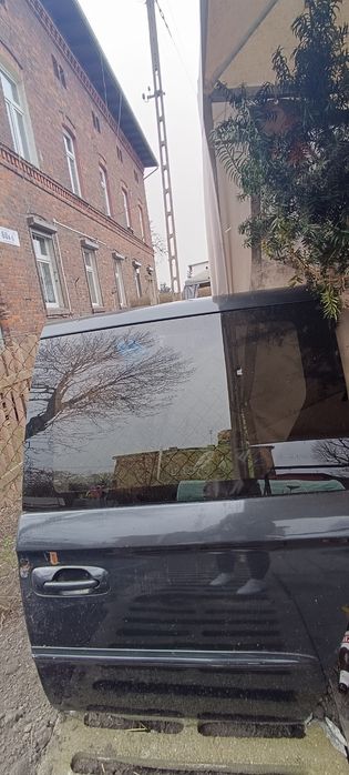 Szyba lewa Chrysler Grand Voyager 2002