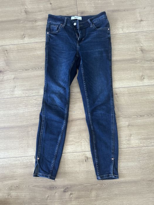 Spodnie jeans reserved