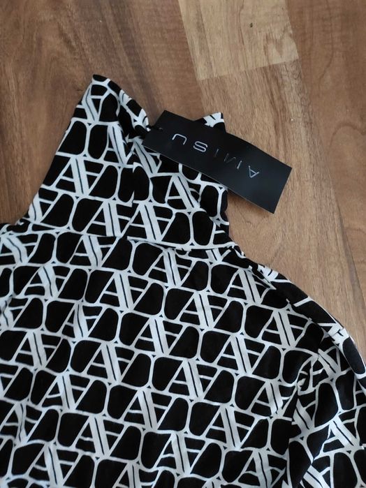 Nowy  golf czarno biały M i bluzka rozm L