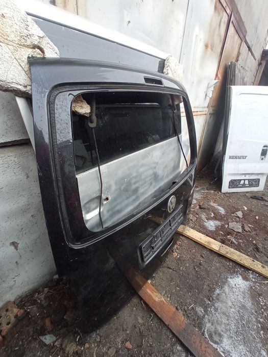 Дверь задняя ляда Volkswagen Caddy 2003-2014 черный цвет без стекла