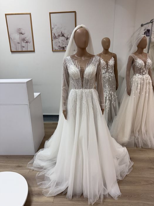 Nowa piekna błyszcząca suknia ślubna bogato zdobiona z rękawem 38