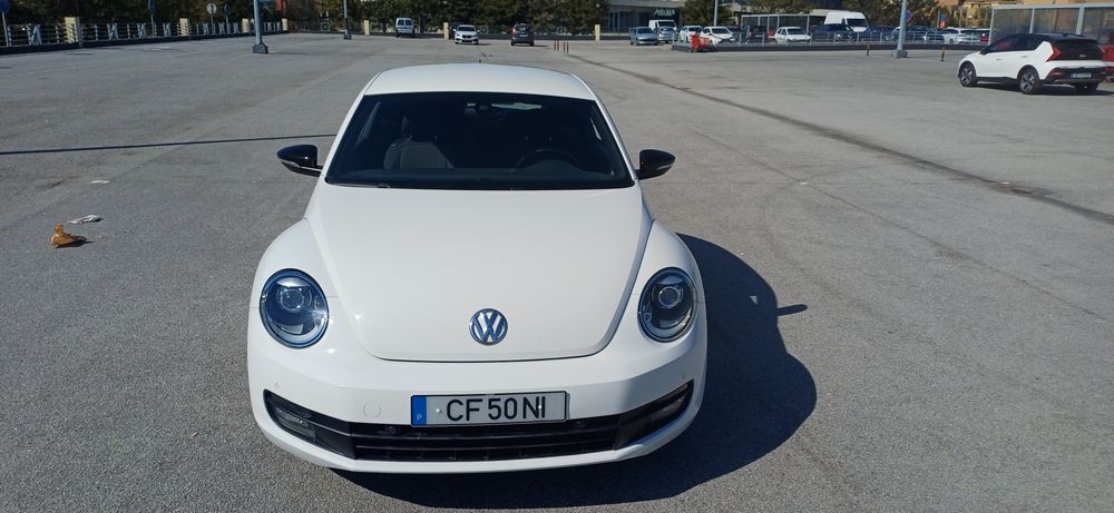 VW Beetle coupe TSI troca retoma