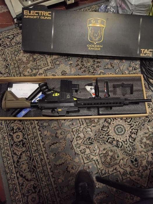 Arma de jogos com mira selenciador