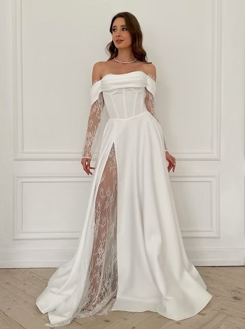 Весільна біла сукня