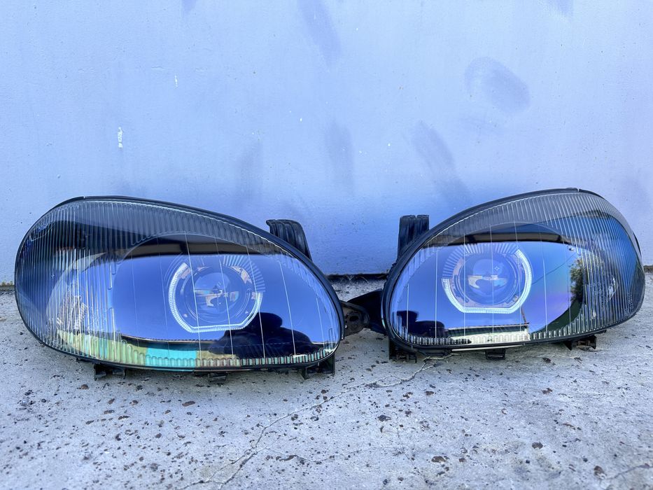 Фари на Ланос установка лінз тюнінг оптики стопи ланос полировка фар