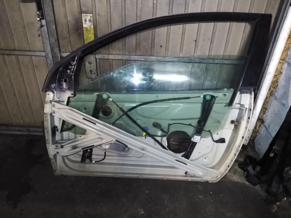 Ramka stelaż drzwi podnośnik szyba VW Golf V 3d prawa lewa