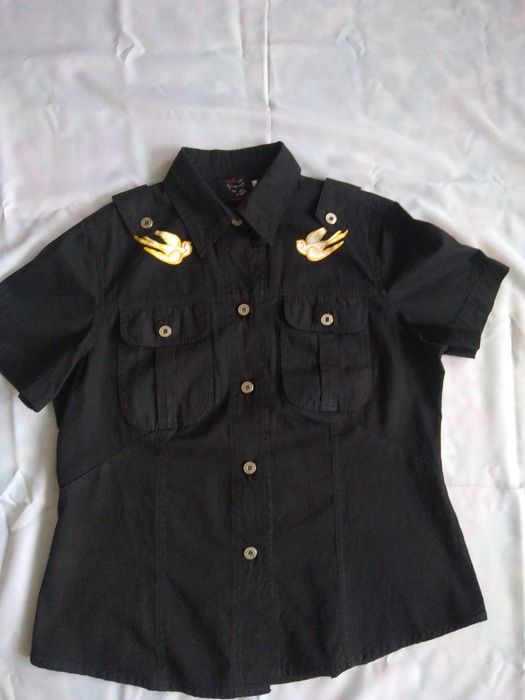 Блузки й сорочки жіночі