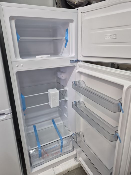 Новий холодильник Grunhelm GRW-143DD висота 143 см гарантія 3 роки