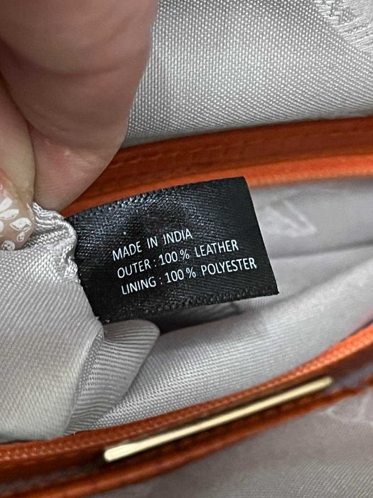 не велика помаранчева шкіряна сумка Modalu