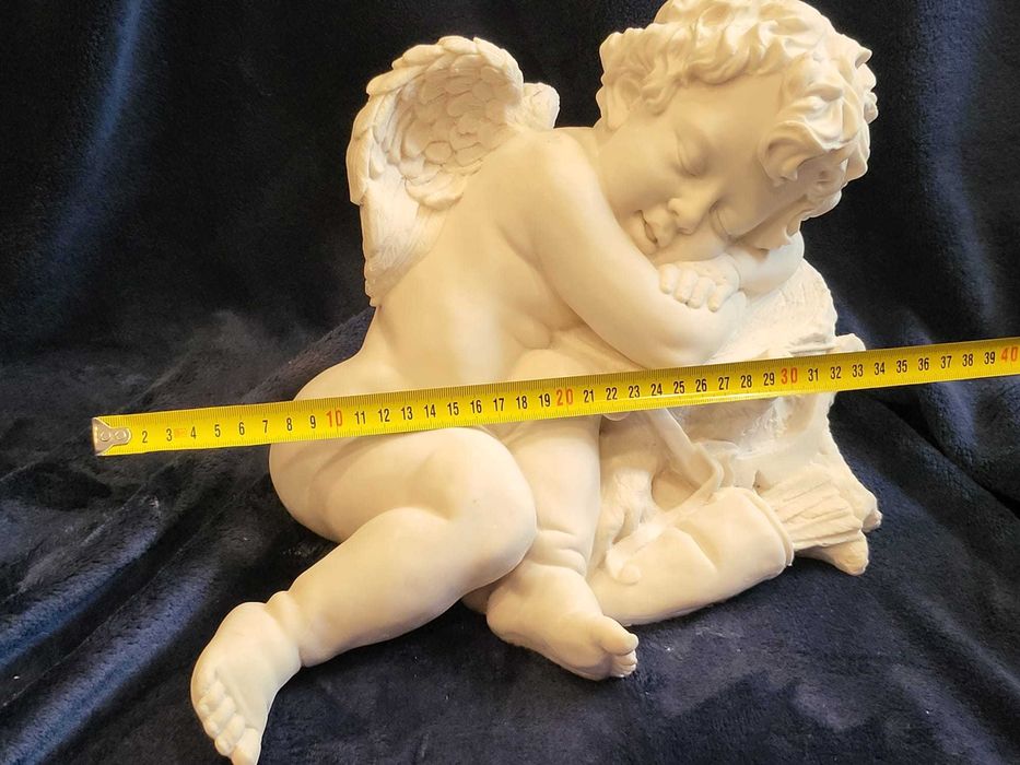 Cupido a Descansar em Marfinite