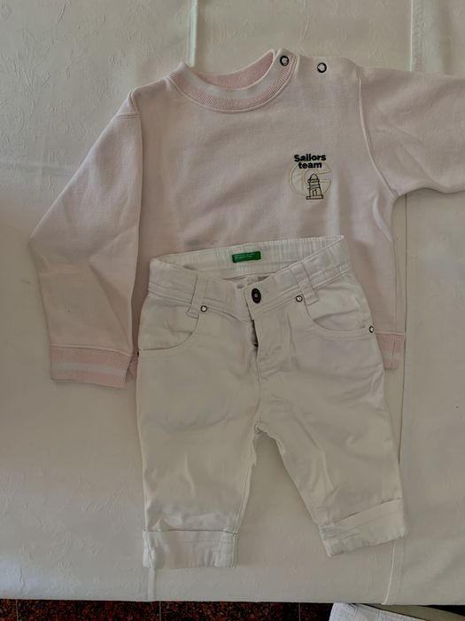 Sweat cor-de-rosa e calças curtas brancas
