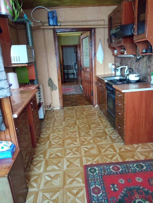 Продам часину будинка в центрі Зміїва