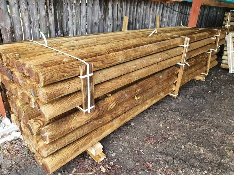 Paliki toczone, słupki drewniane, palisada, huśtawka