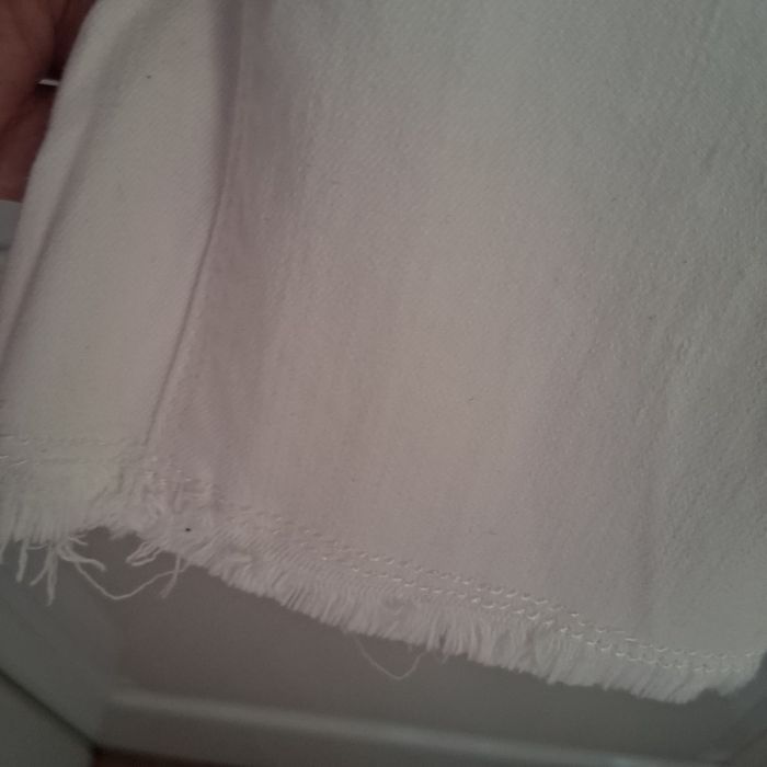 Jeansy białe Monnari