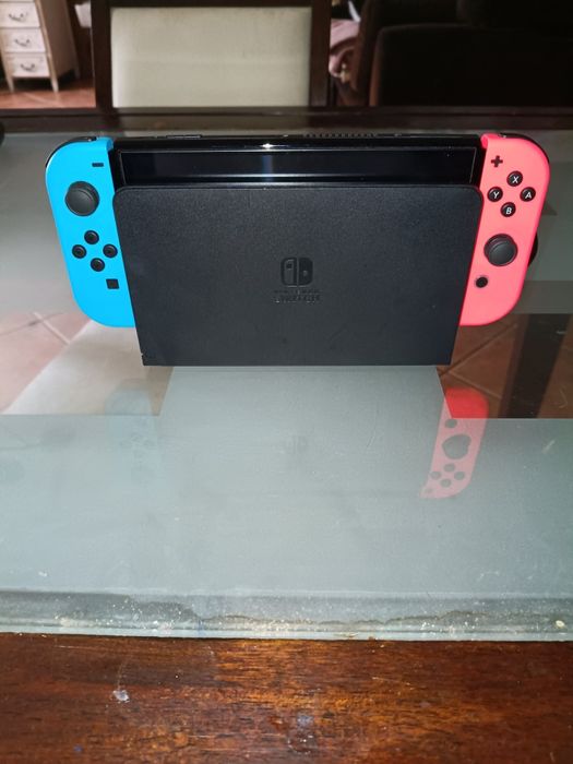 Nintendo Switch Oled Como Nova Com Quatro Jogos De Oferta