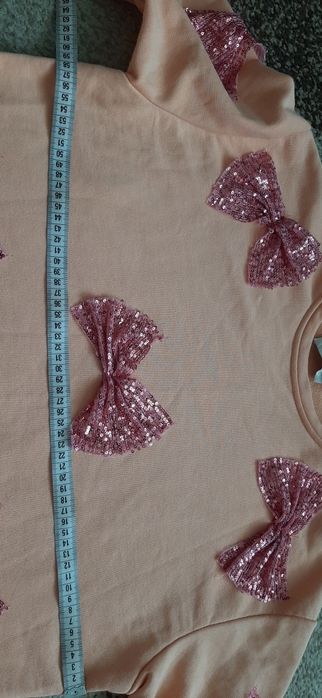 Bluza z cekinowymi kokardami rozm. Xxl