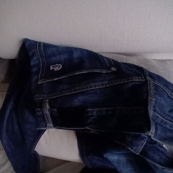 Spodnie Lacoste UK34 dzins bawelna
