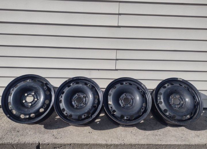 Kask,skórzana kamizelka    felgi stalowe  5x100 15