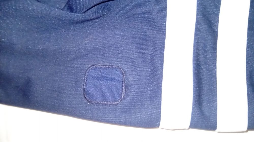 Олімпійка Ellesse