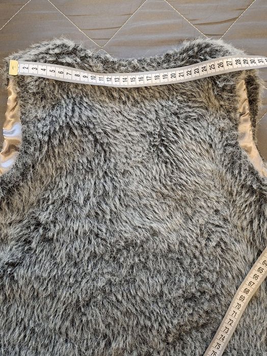 Тепла жилетка для дівчинки(8-10 років)