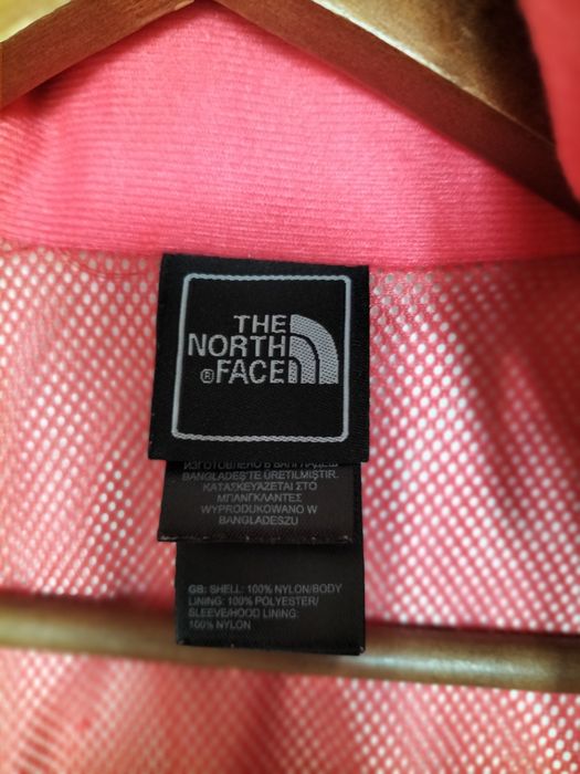 The North Face oliwkowa kurtka, wiatrówka z kapturem