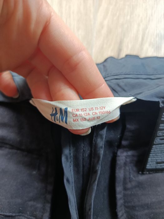 Czarne eleganckie spodnie garniturowe komunia  H&M r.152