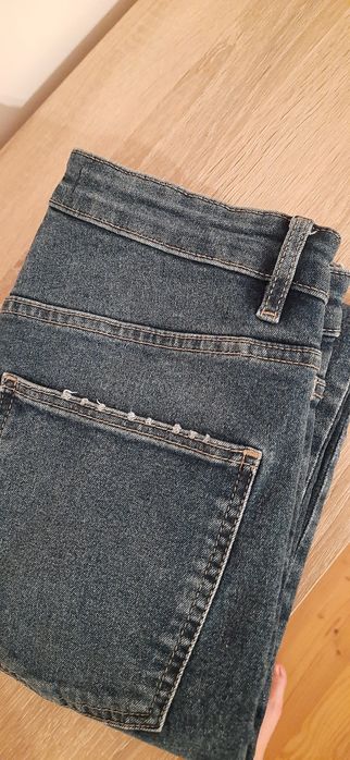 Spodnie jeans M 38