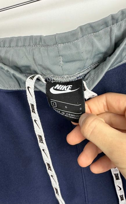 Spodnie dresowe Nike bawełniane granatowe r. L