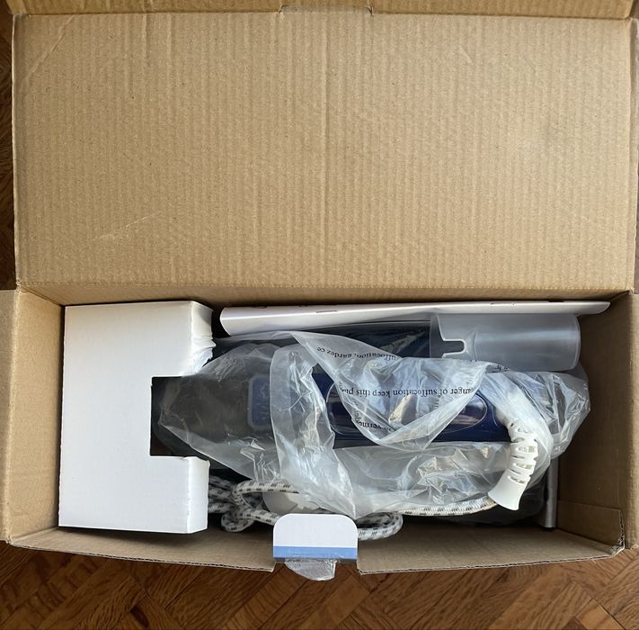 Ferro de engomar a vapor64285404728963122