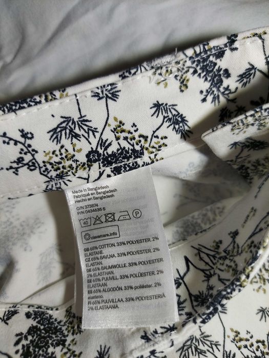 Білі штани з принтом H&M