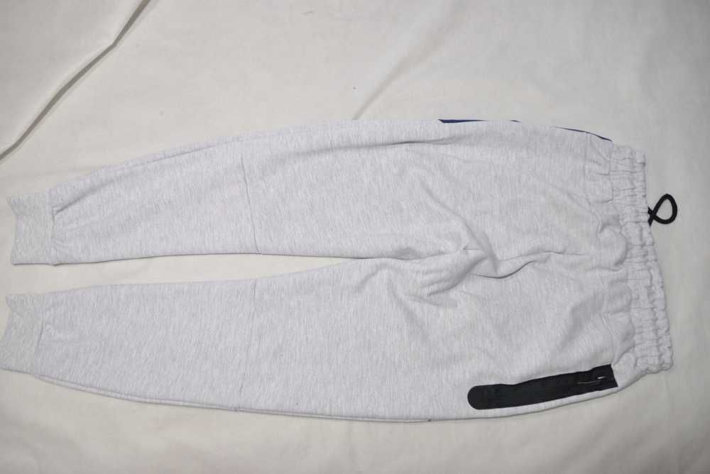 Nike L bawełniane męskie spodnie dresowe joggery