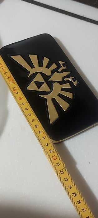 Кошелёк с золотистым изображением Королевского герба Хайрула