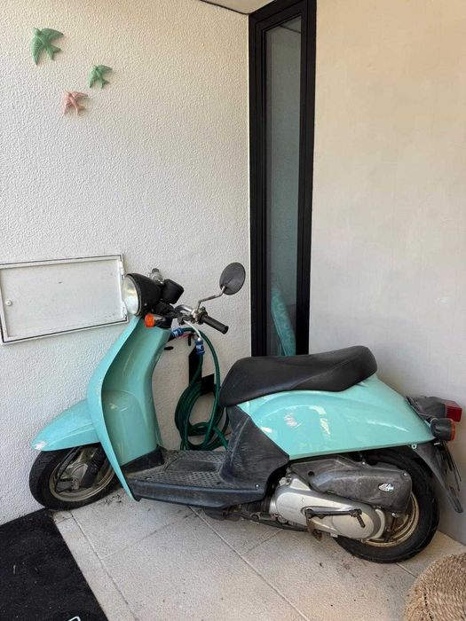 Mota Honda em excelente estado