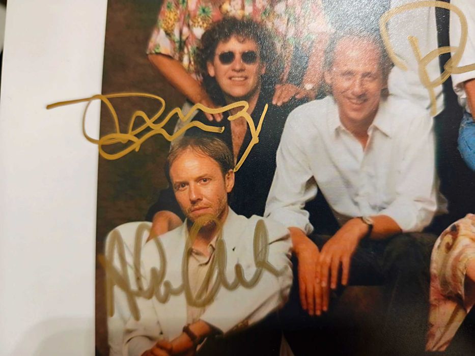 Dire Straits - Autografy na zdjęciu
