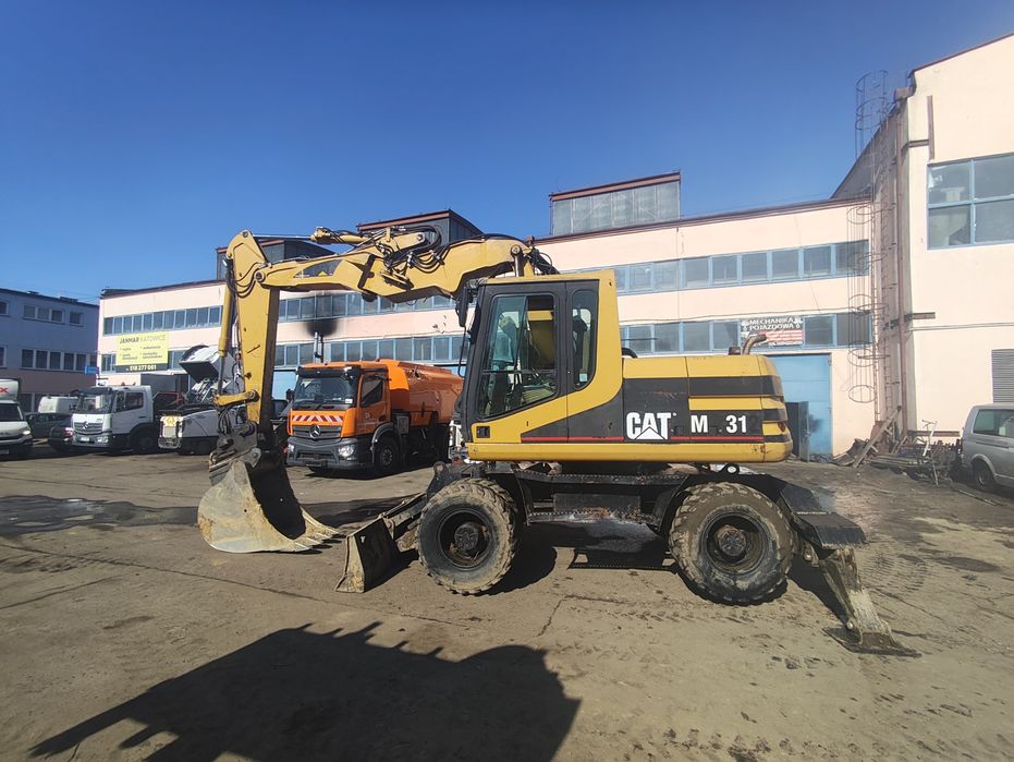Cat M312 koparka kołowa