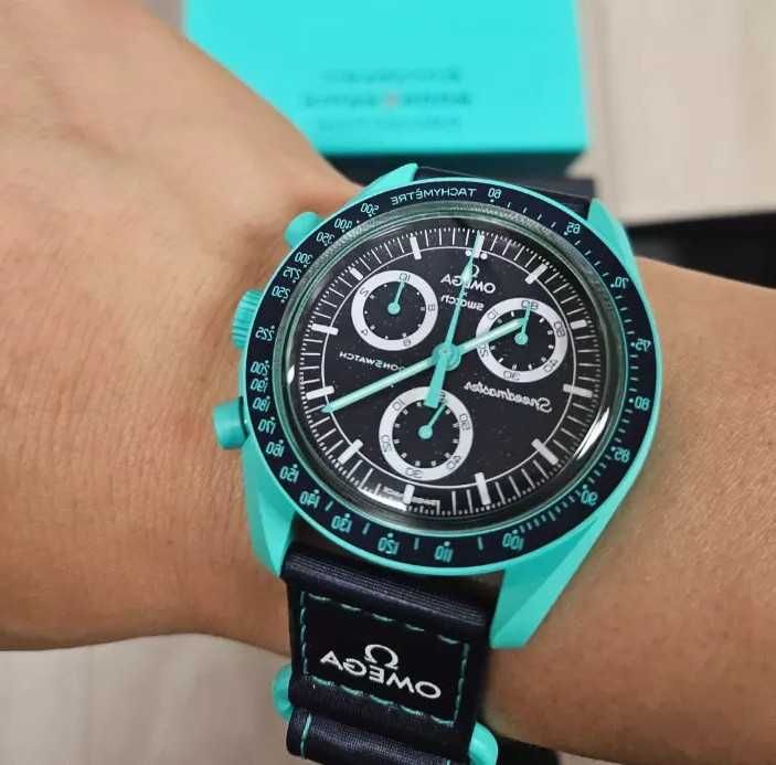 Omega Swatch SO33L103 Zorza Polarna jest bez zarzutu. Cena do negocjacji.