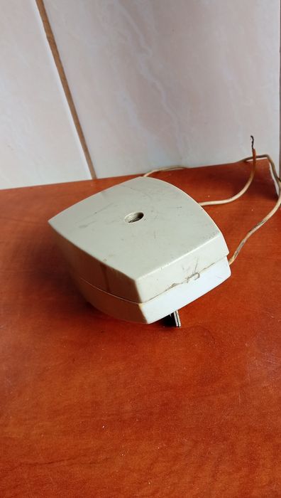 Biała lampka przednia rowerowa Romet