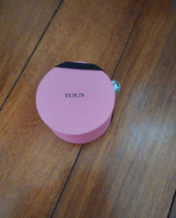 Colar dourado com urso