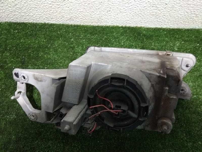 farol direito mazda 323