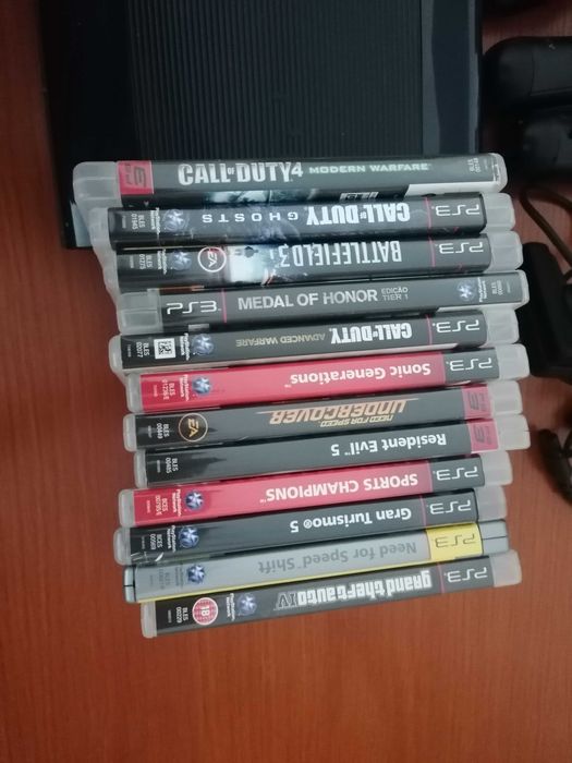 PS3 Slim, Controllers and Games64550360599809121