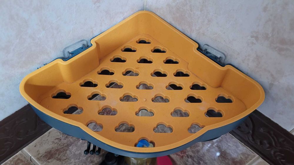 Prateleira de banheiro triangular