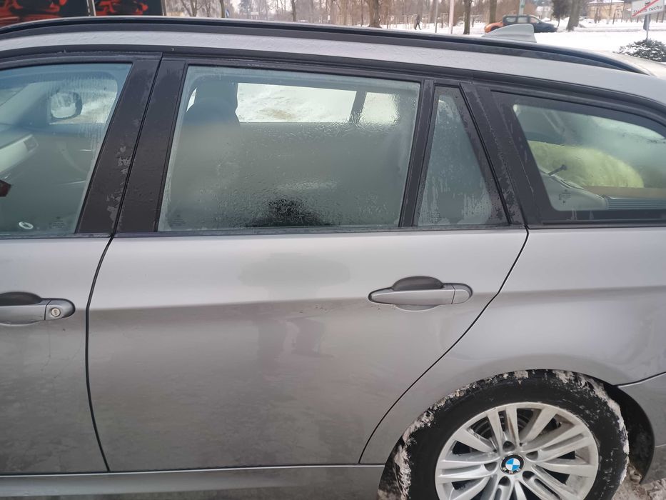 Lewe tylne drzwi BMW e91 lift 2010r szare spacegrau  Kompletne Ładne