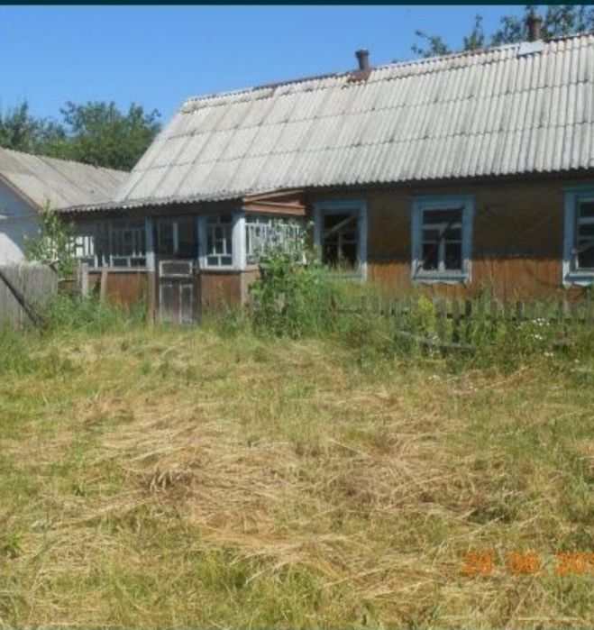 Продам будинок і земельну ділянку біля будинку