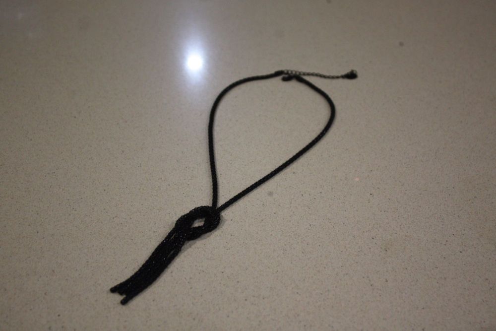 Colar preto miçangas