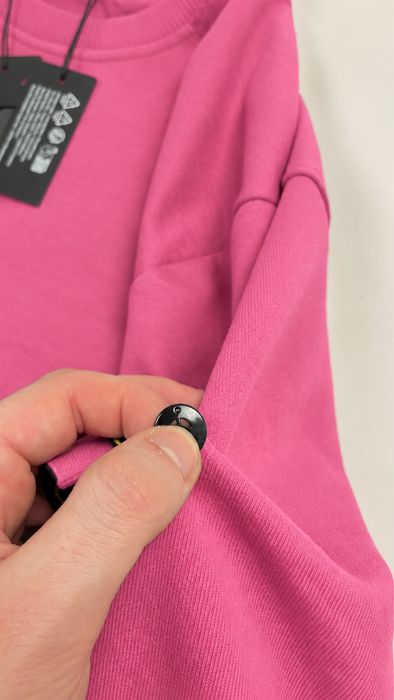 Рожевий Stone Island світшот