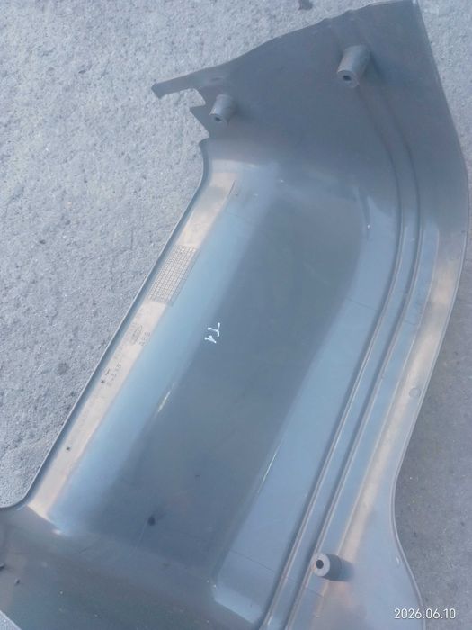 Acabamento lateral do banco direito Ford Transit 1991-1994 (92VB-V600K65-BEW)