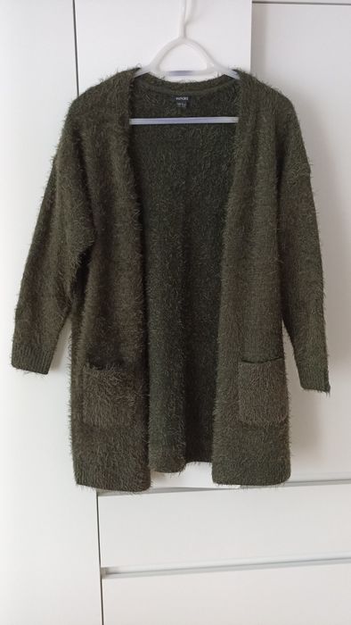Ciepły sweter z kieszeniami rozmiar xl Nowy.